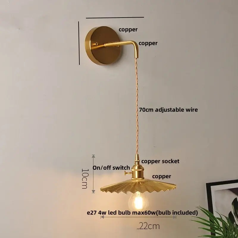 Modern gold-toned copper wall light with scalloped clear glass led shade and adjustable 70cm wire for decorbites clear glass decor