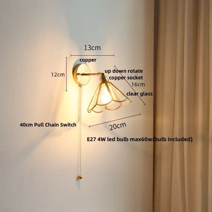 Copper-finished modern wall light with clear glass shade and up-down rotating copper socket for decorbites led wall use