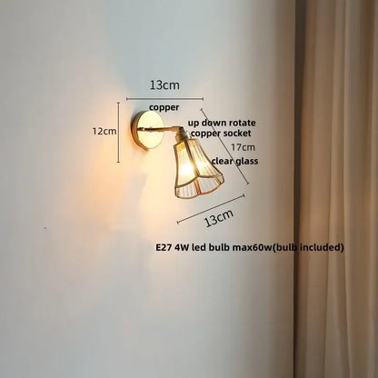 Copper-finished wall sconce with clear glass shade and adjustable rotation for modern gold fluted decorbites led wall use