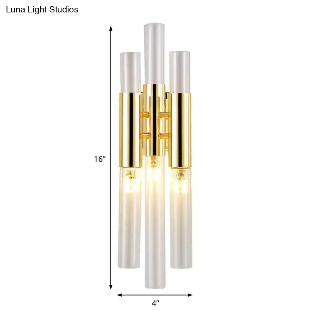 Modern gold frosted glass flute wall sconce with three vertical cylinders for living room lighting