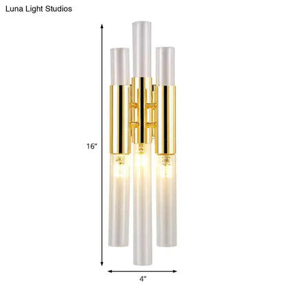 Modern gold frosted glass flute wall sconce with three vertical cylinders for living room lighting