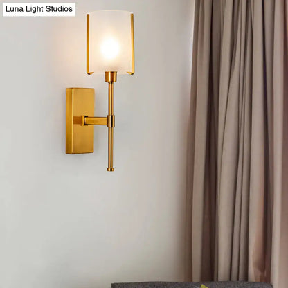 Modern gold wall sconce with frosted glass shade and pencil arm light fixture for bedroom lighting