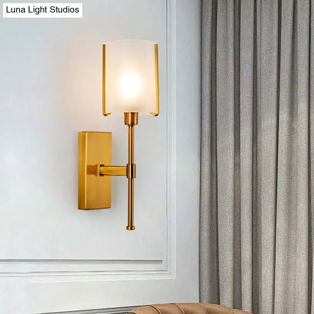 Modern gold pencil arm wall sconce light fixture with frosted glass shade and minimalist rectangular design for bedroom