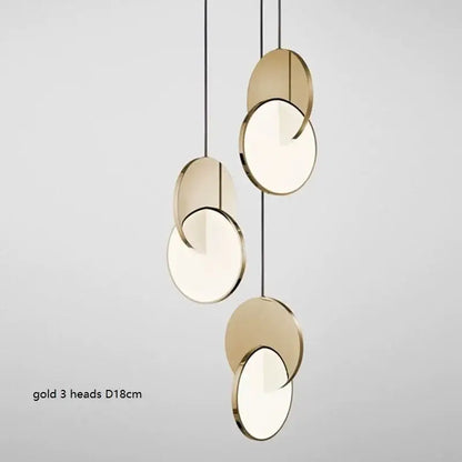 Modern gold geometric circle pendant light with three frosted glass heads and metallic rims for dining room decorbites geometric circle