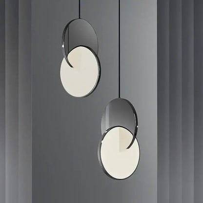 Modern gold geometric circle pendant light with sleek black chrome frames and soft white diffusers for dining room decorbites geometric circle