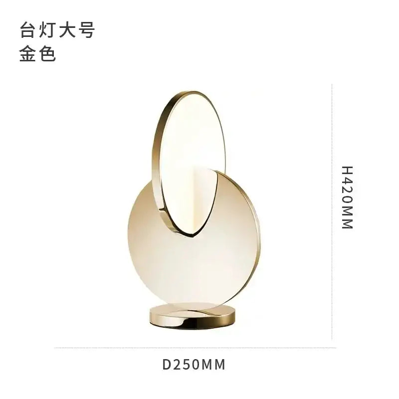 Modern gold geometric circle pendant light with overlapping glass discs and polished metallic base for dining room decorbites geometric circle