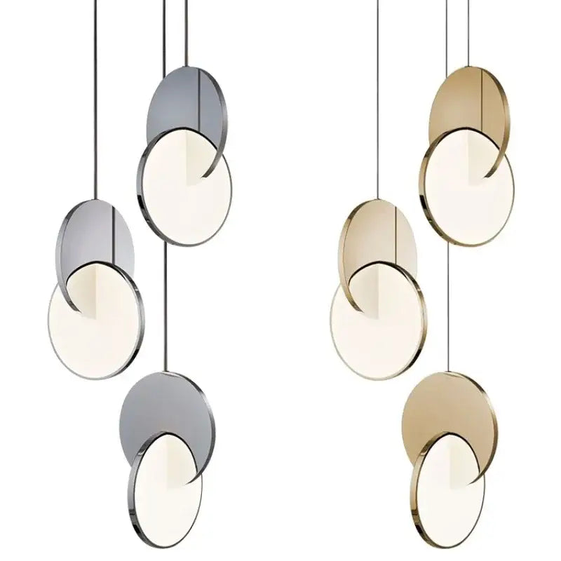 Modern gold geometric circle pendant light with overlapping silver and gold discs for dining room decorbites geometric circle