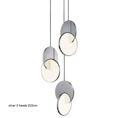 Silver pendant light with three geometric circle heads featuring sleek metallic frames and soft diffused illumination decorbites geometric circle