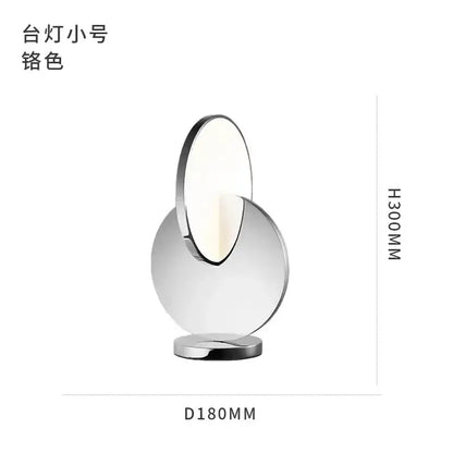 A modern gold geometric circle pendant light with overlapping discs and polished chrome base for dining room decorbites geometric circle