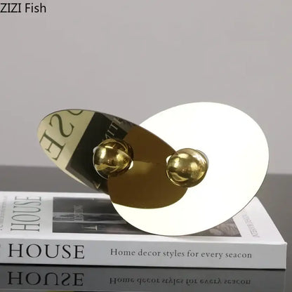 Modern gold geometric circle sculpture with reflective discs and spherical accents metal ornament for living room decor