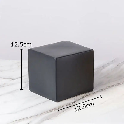 Black ceramic modern gold geometric cube round statue decor measuring 12.5cm for living room display