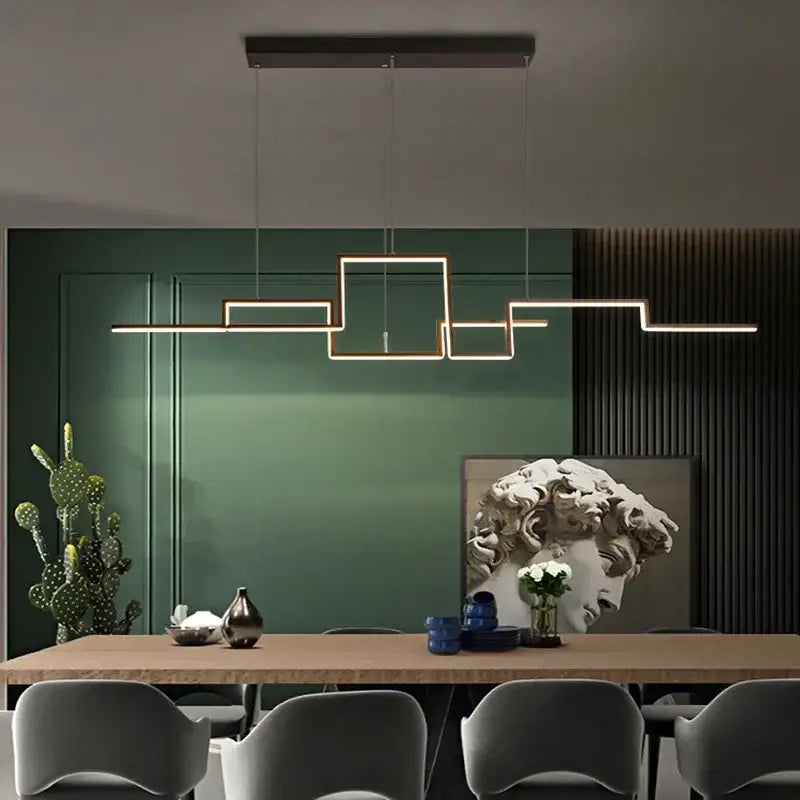 Modern gold geometric led pendant light with interconnected rectangular frames in warm metal for dining room decorbites geometric led