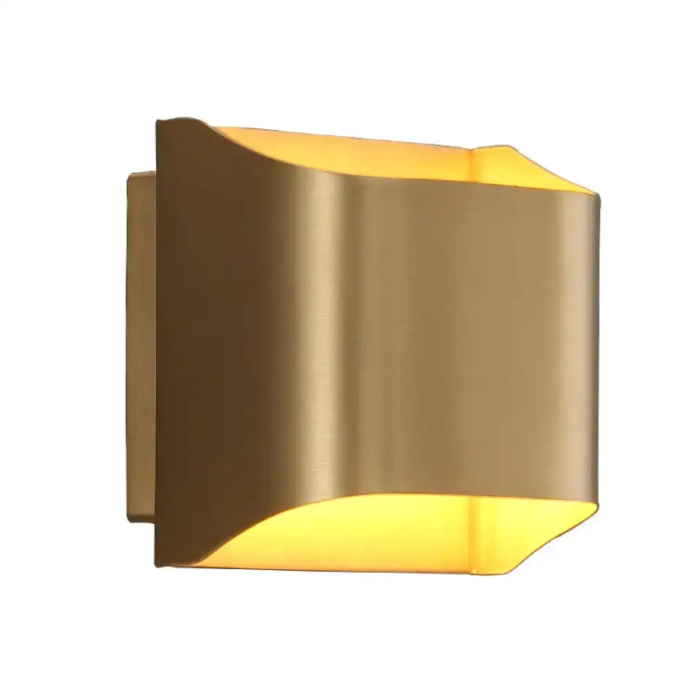Modern gold geometric led wall sconce with sleek curved design and warm light featuring a g9 bulb base