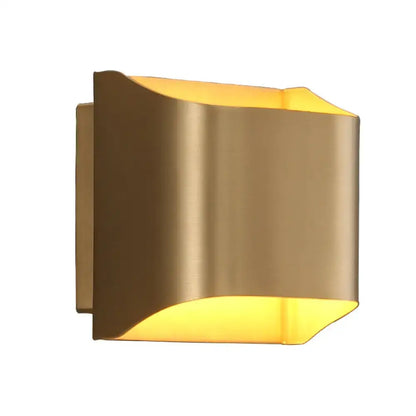 Modern gold geometric led wall sconce with sleek curved design and warm light featuring a g9 bulb base
