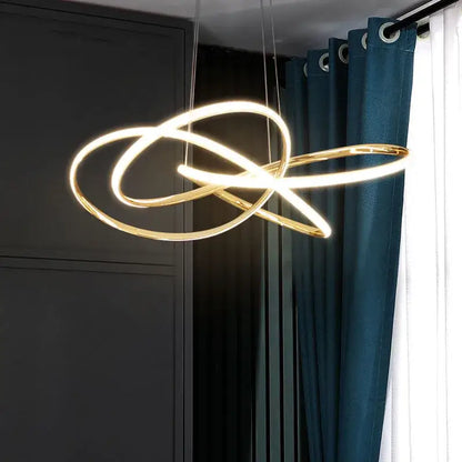 Modern gold geometric line led chandelier featuring a gold-toned intertwined circular design for dining room decorbites geometric line