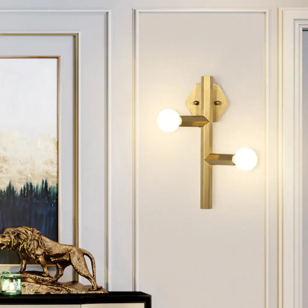 Modern gold geometric wall light with two spherical bulbs direct wired electric vertical tube corner design