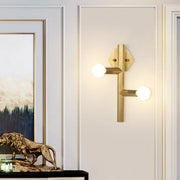 Modern gold geometric wall light with two spherical bulbs direct wired electric vertical tube corner design