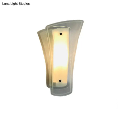 Modern gold geometric wall sconce with curved frosted glass panels and warm glowing light for 220v-240v 110v-120v use