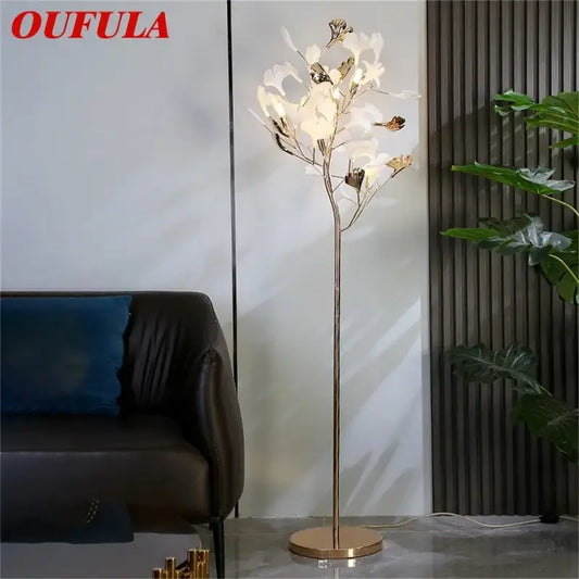 Oufula floor lamp with slender gold metal stem and white ginkgo flower light fixtures for modern living room decorbites ginkgo flower