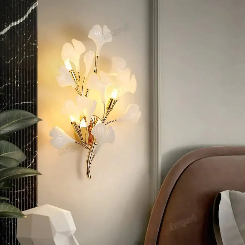 Modern gold ginkgo leaf porcelain wall sconce with translucent white ginkgo leaf shades for bedroom lighting
