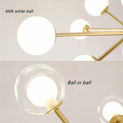 Modern gold glass ball branch chandelier with gold-toned metal arms and spherical milk white glass shades decorbites glass ball