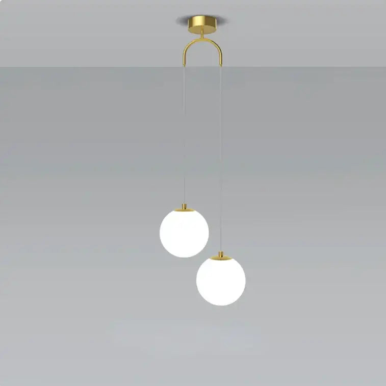 Modern gold-toned glass ball dual head pendant light with frosted glass shades for bedroom decorbites pendant light