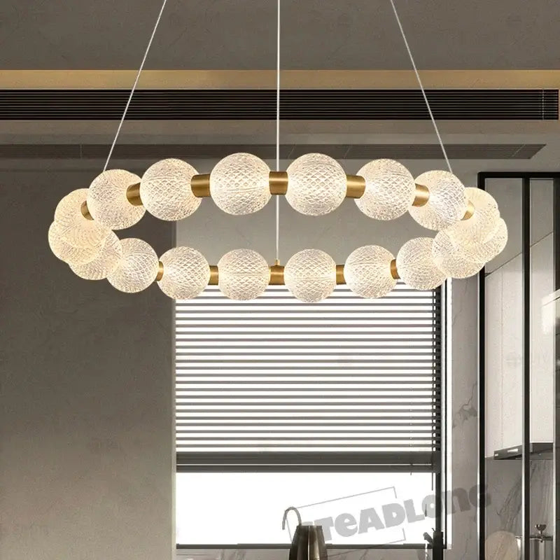 Modern gold glass ball led ceiling chandelier with textured white glass spheres and gold-toned metal connectors decorbites glass ball