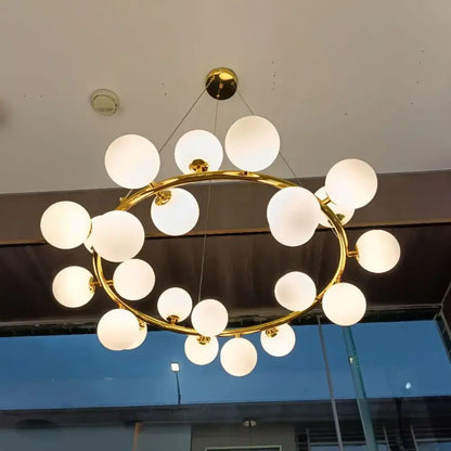 Modern gold glass ball led chandelier with frosted globe bulbs arranged in a circular pattern for dining room decorbites glass ball