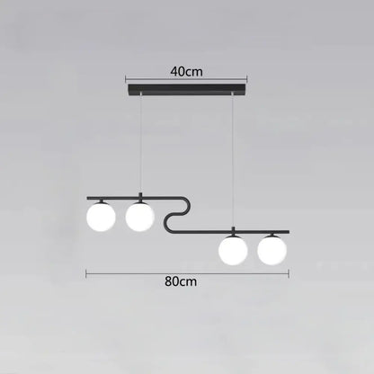 Modern black metal pendant light with four white glass balls in curved design for dining room decorbites glass ball led