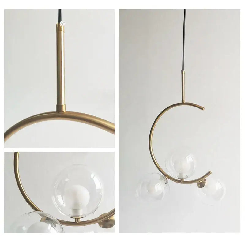 Modern gold crescent-shaped brass pendant light with clear glass globe bulbs for dining room decorbites glass ball led chandelier