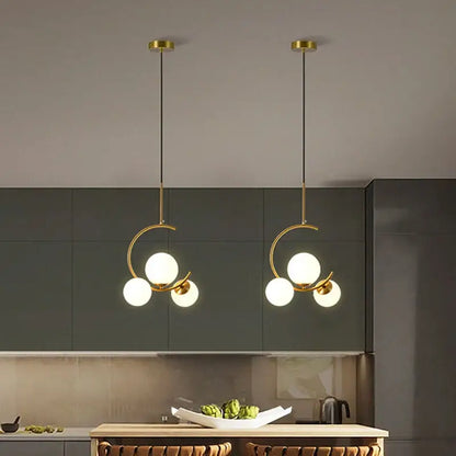 Modern gold glass ball led chandelier with three frosted glass spheres suspended by black cords for dining room decorbites glass ball