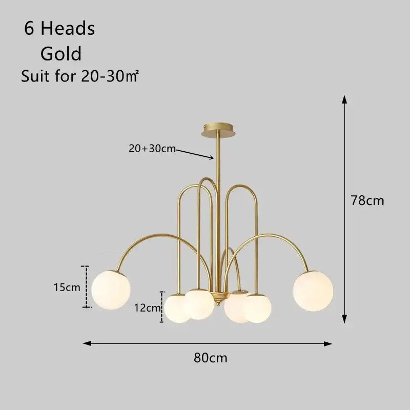 Modern gold glass ball led chandelier with six spherical glass shades and curved metal arms for dining room decorbites glass ball