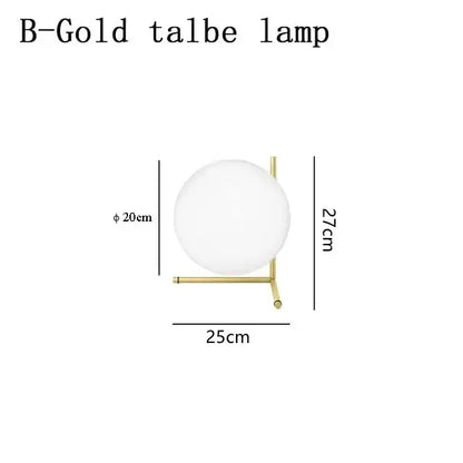 A modern gold glass ball led chandelier light with a frosted spherical shade and minimalist geometric base decorbites glass ball