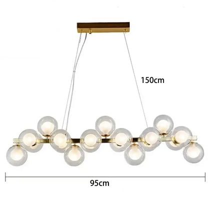 Modern gold glass ball led chandelier featuring multiple clear glass globe bulbs in a linear pattern pendant lights decorbites glass ball