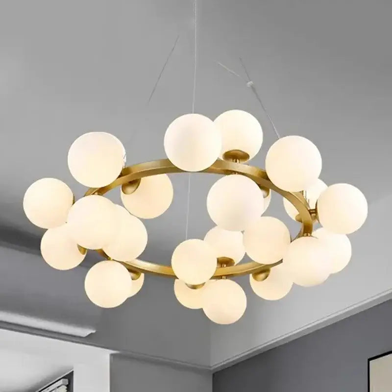Modern gold glass ball led chandelier pendant light featuring frosted glass globes for elegant living room decorbites pendant lights