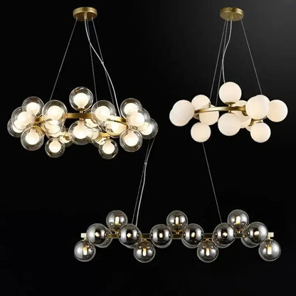 Modern gold glass ball led chandelier featuring brass spherical globes in clear frosted white and mirrored finishes pendant lights decorbites glass ball
