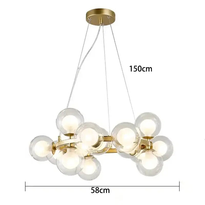 A modern gold brass-finished pendant light with clear glass ball led bulbs for living room decorbites glass ball design