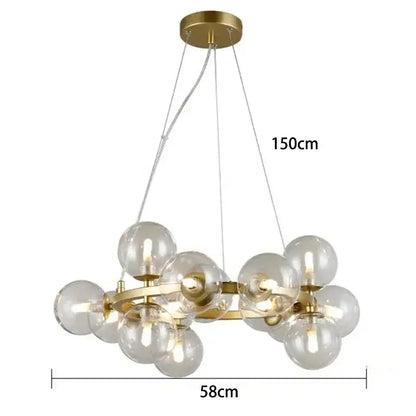 A modern gold glass ball led chandelier with multiple clear globe bulbs perfect for pendant lights decorbites decor