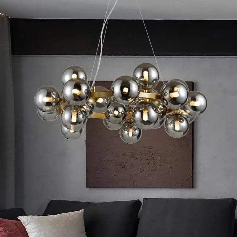 Modern gold glass ball led chandelier with multiple reflective silver spheres on gold frame pendant lights decorbites glass ball