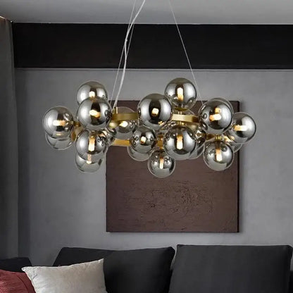 Modern gold glass ball led chandelier with multiple reflective silver spheres on gold frame pendant lights decorbites glass ball