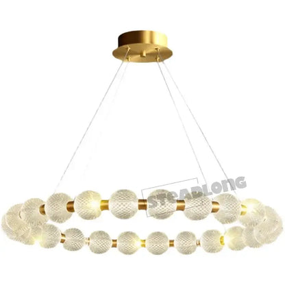 Modern gold glass ball led chandelier featuring double-ring design with textured frosted glass spheres and brass accents