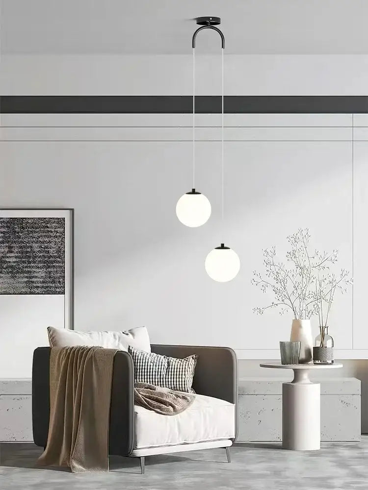 Modern black metal pendant chandelier with spherical white glass ball led shades for bedroom decorbites glass ball lighting