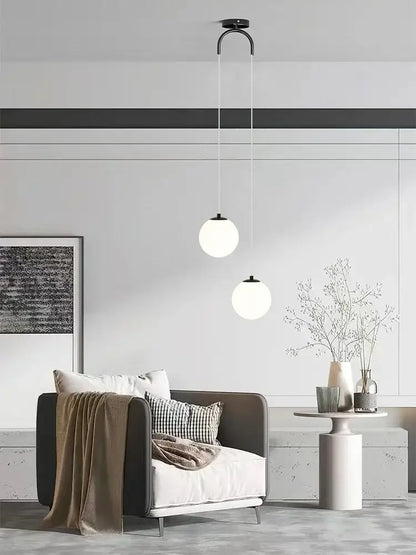 Modern black metal pendant chandelier with spherical white glass ball led shades for bedroom decorbites glass ball lighting