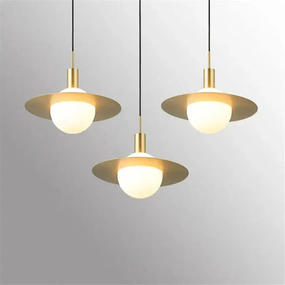 Three modern gold glass ball led pendant lights with metal shades and frosted globes for dining room decorbites pendant light