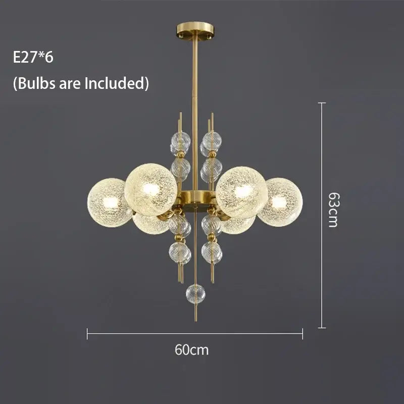 Modern gold glass ball led pendant light featuring six textured glass globes and crystal spheres on brass frame for kitchen island