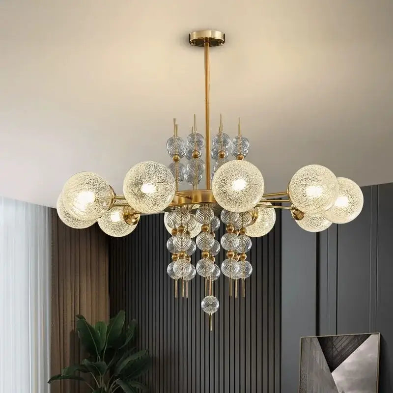 Modern gold glass ball led pendant light with clear textured glass spheres and crystal accents for kitchen island decorbites