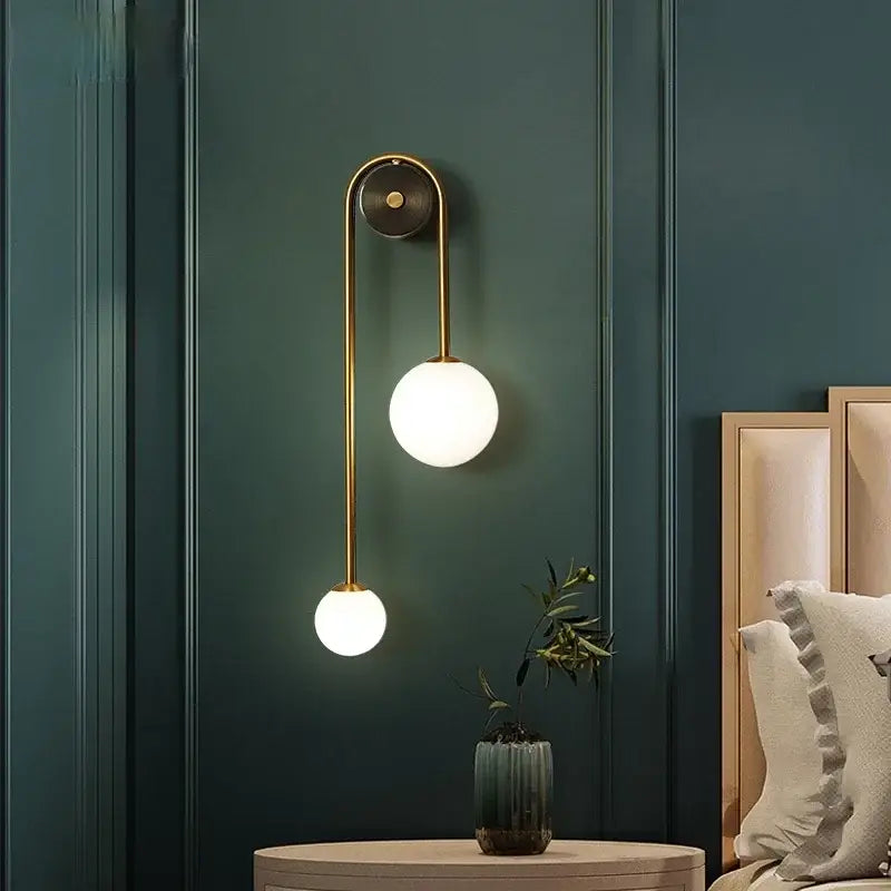Modern gold glass ball led wall lamp with two frosted glass shades ideal for bedroom and study decorbites wall lamp