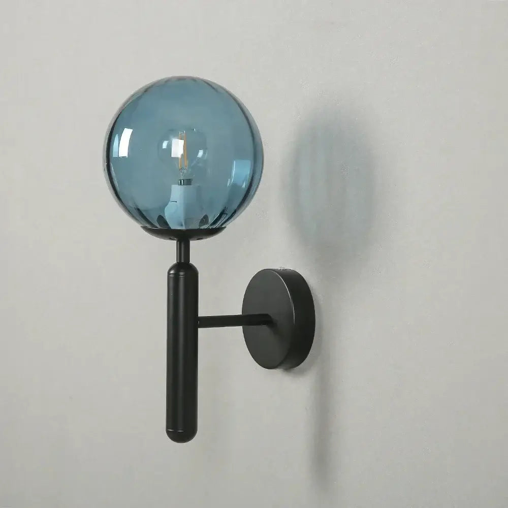 Modern gold glass ball led wall lamp featuring a blue glass globe wall lamp with black metal base for bedroom decorbites glass ball