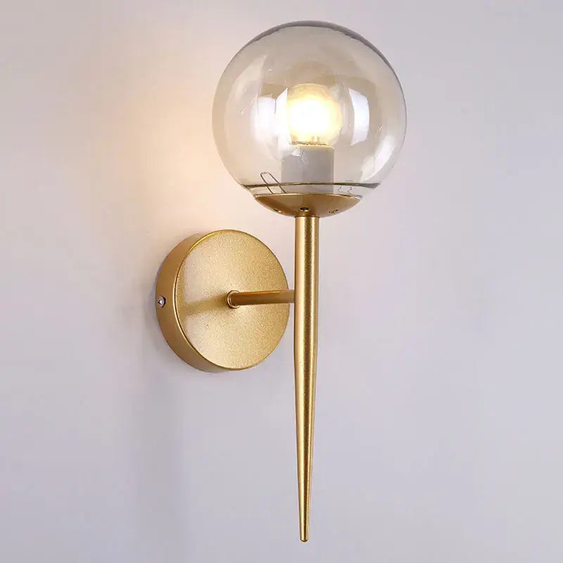 Modern gold wall lights with decorbites glass ball led globe and slender stem for bedroom and passage decor