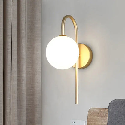 Modern gold wall sconce with curved arm and frosted glass ball led shade for living room decorbites glass ball lighting